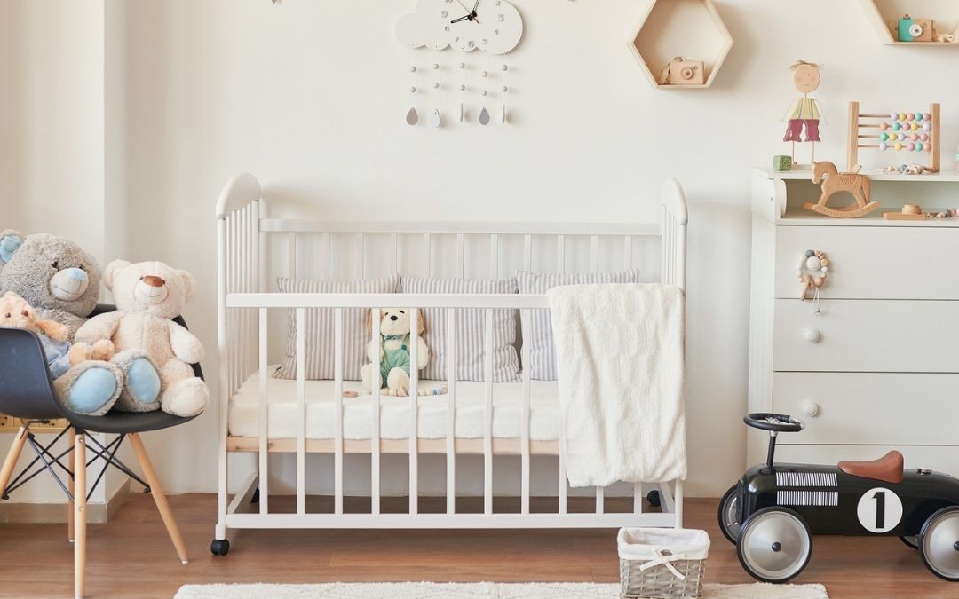 How to properly care for your baby’s crib sheet protector and other bedding